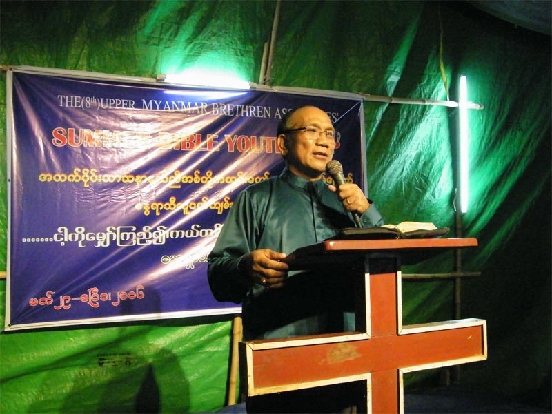 Brother Khup preaching at the summer youth camp in Myanmar.