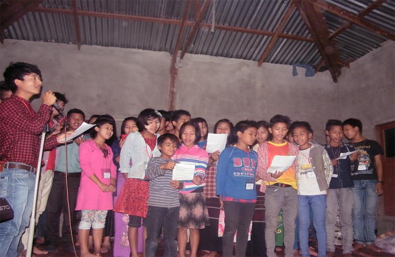 Kids singing at the Summer Youth Camp in Myanmar.