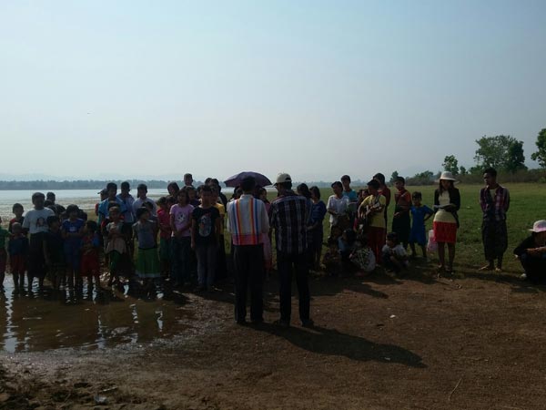 Learn more about the baptism program at the Ngwetaung Dam.