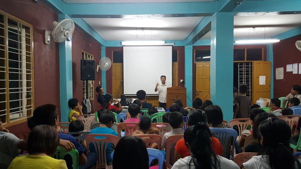 Missionary Kap Do preaching at Summer Youth Camp