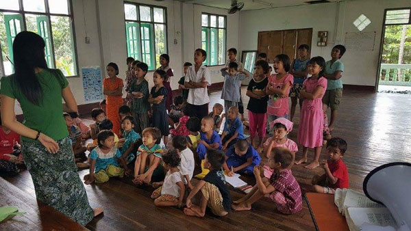 Some children accepting and inviting Jesus Christ to be their personal Savior and Lord