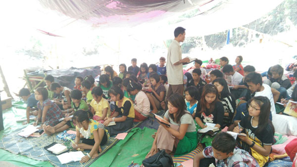 Brother Kyaw Niang Oo teaching the gospel at summer youth camp (April 4-9, 2016)