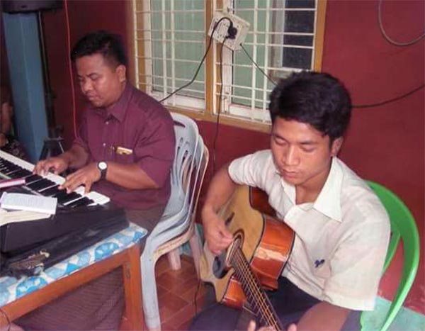 Mr. Khual (music instructor) and Mr. Nay Linn Aung (2nd year student)
