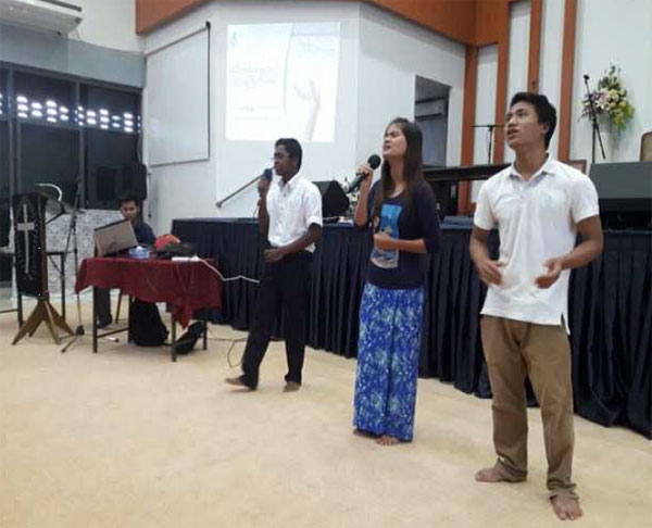 SEA Bible College students are leading in singing