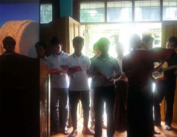 Some students (boys) singing a special number
